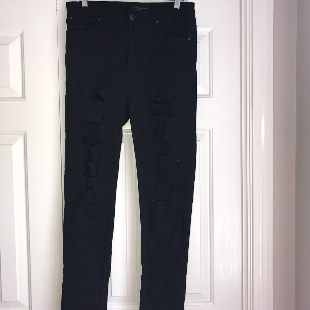 Never worn very high waisted ripped jeans!